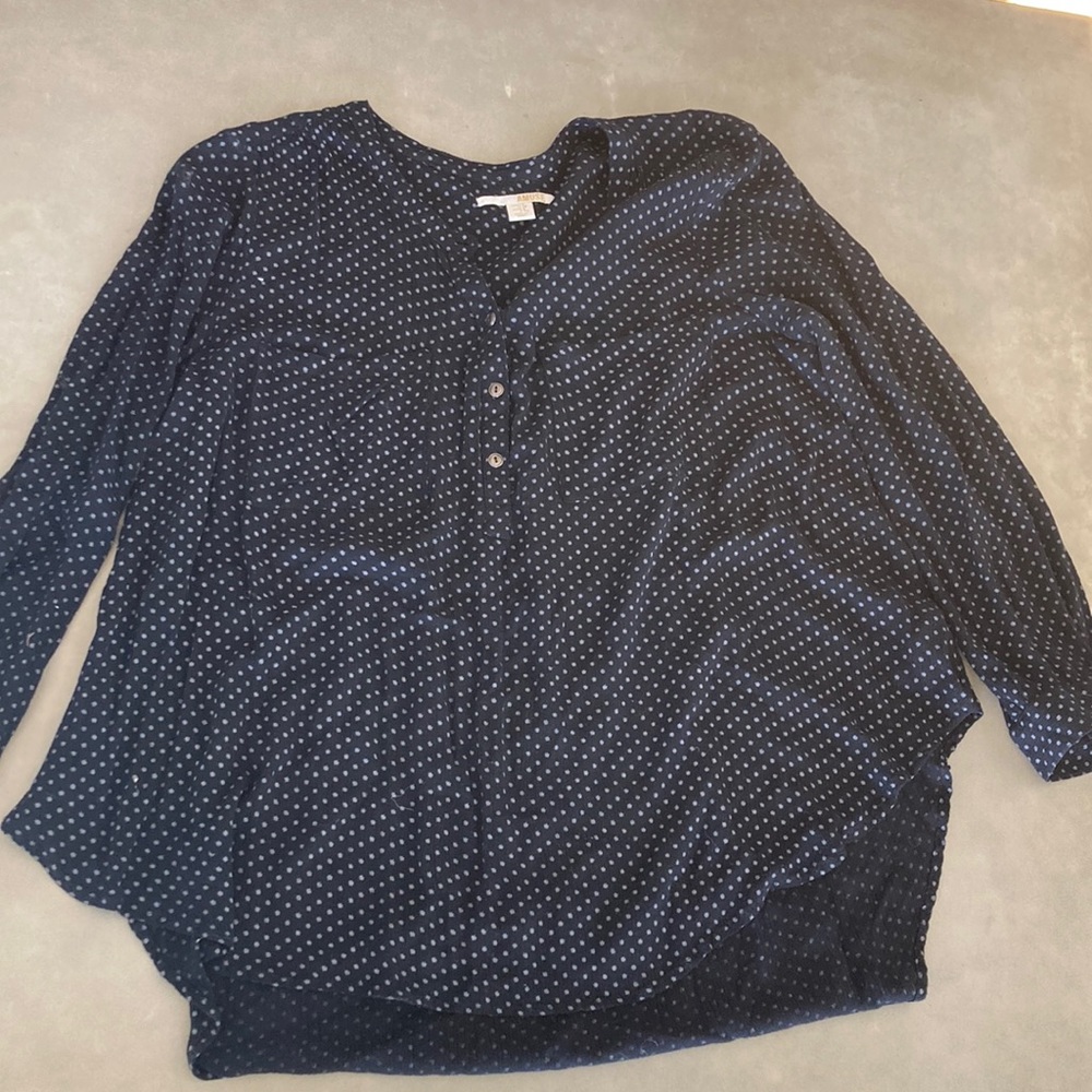 Black half button up- thin material- gold butttons- 2 pockets on the front